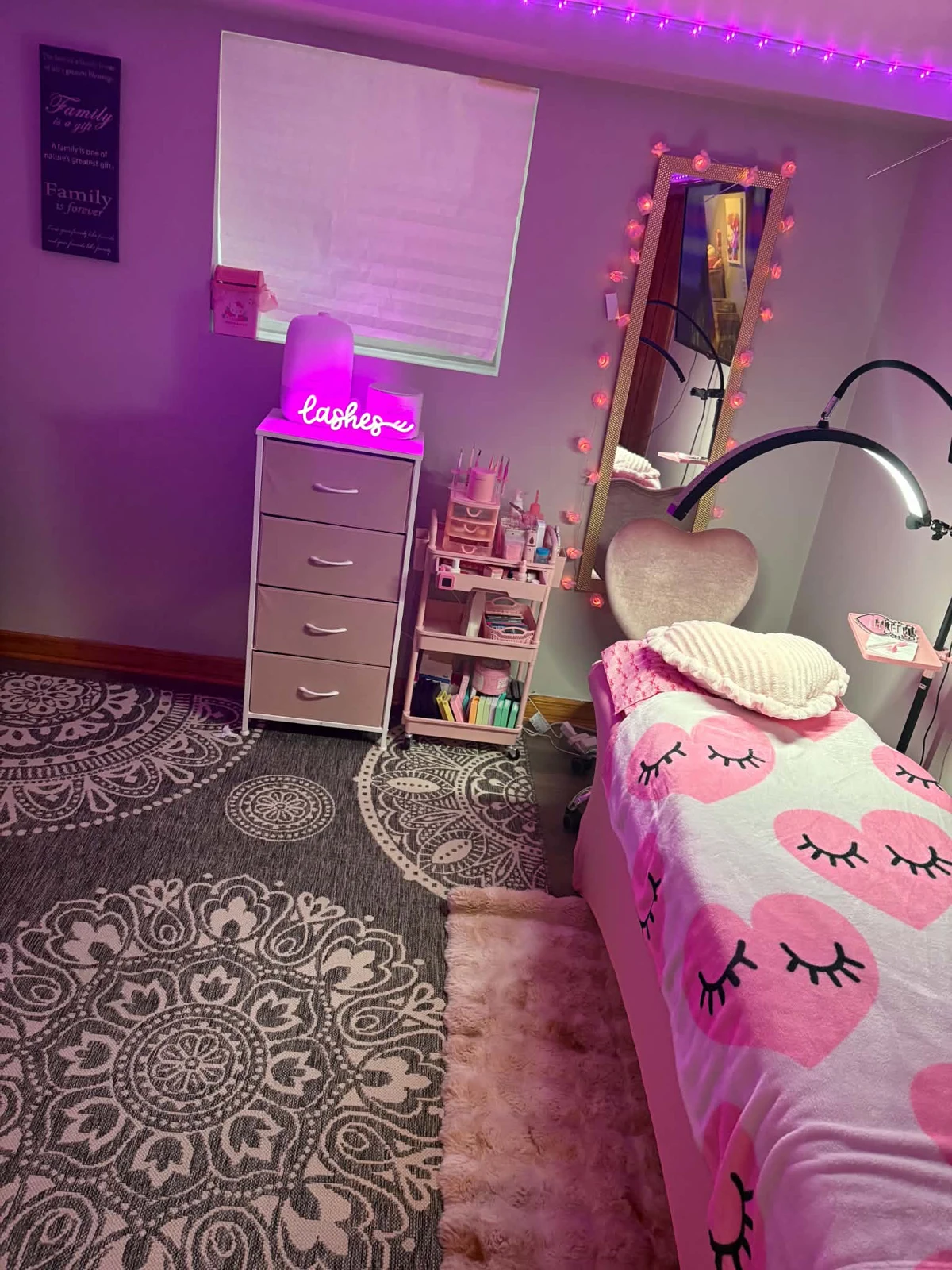 Pink treatment bed and beauty studio interior